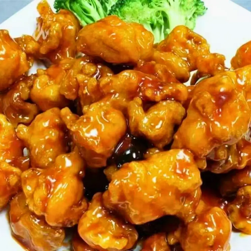 Crispy chicken in sweet and tangy sauce at SAKURA, a Asian-Restaurant in Ludlow