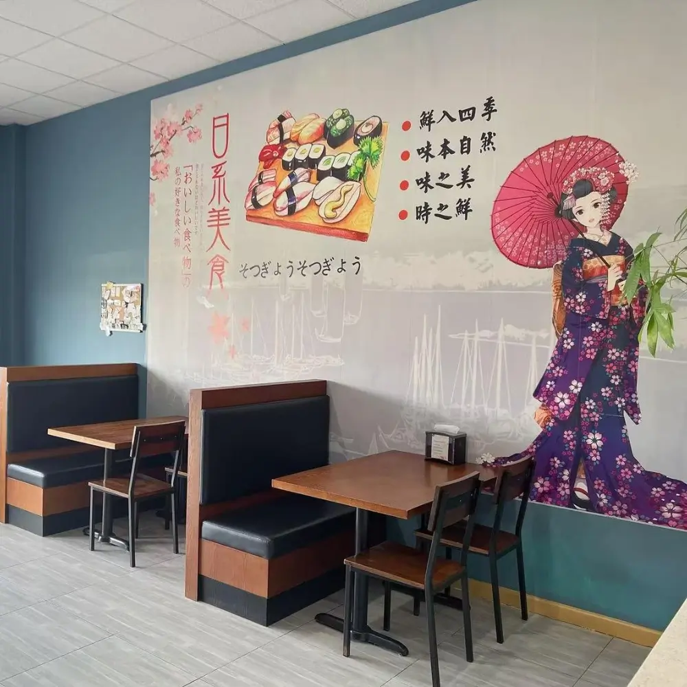 Seating with Japanese mural at SAKURA, a Asian-Restaurant in Ludlow